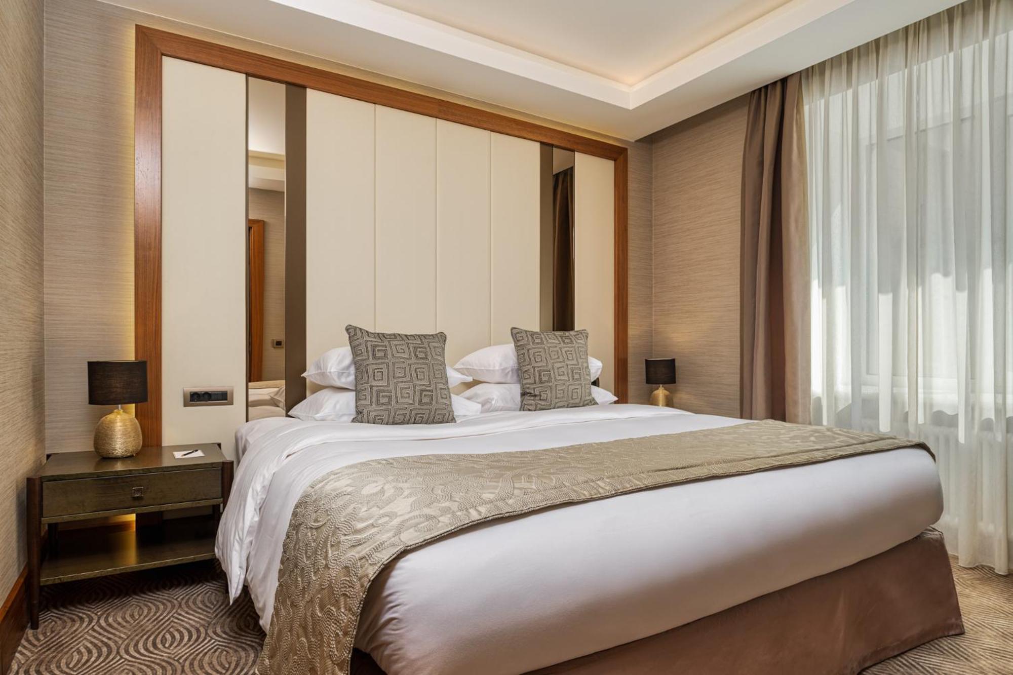 Grand Hotel Kempinski Riga Quarto foto A bedroom at the hotel